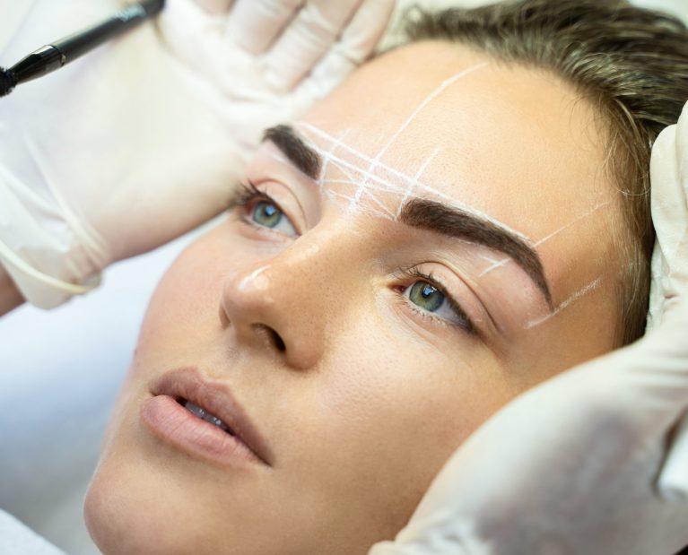 woman-during-professional-eyebrow-mapping-procedur-2023-11-27-04-58-57-utc-scaled.jpg